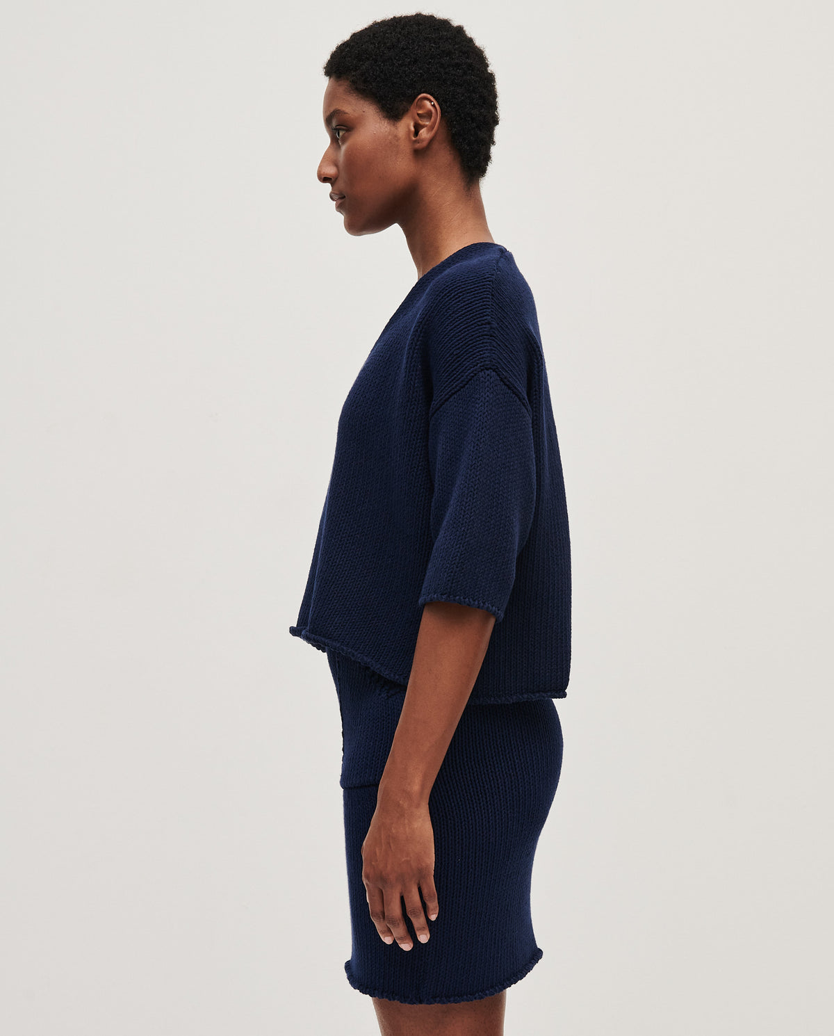 Navy Babaà No9 women's jumper displayed on a model, featuring a cozy fit and soft knit fabric for casual wear.