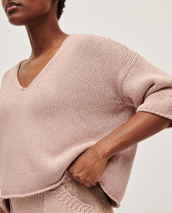 Babaà No9 plum blossom women's jumper featuring a cozy knit design and floral pattern, worn by a woman.