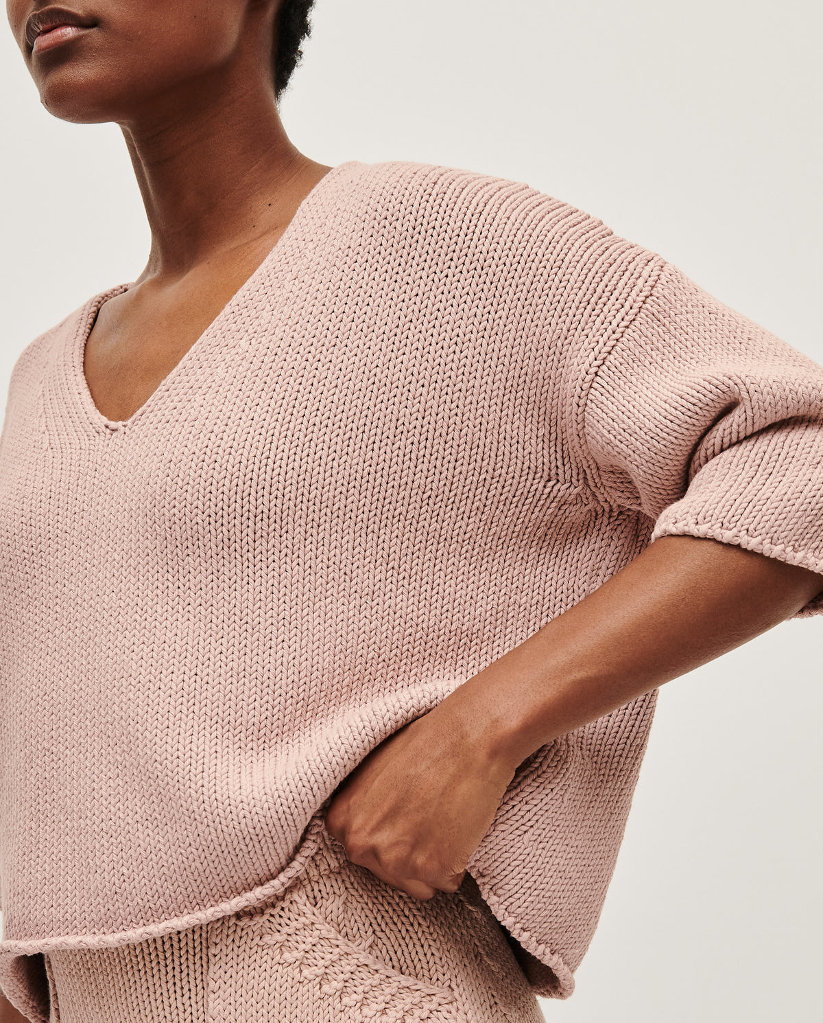Babaà No9 plum blossom women's jumper featuring a cozy knit design and floral pattern, worn by a woman.