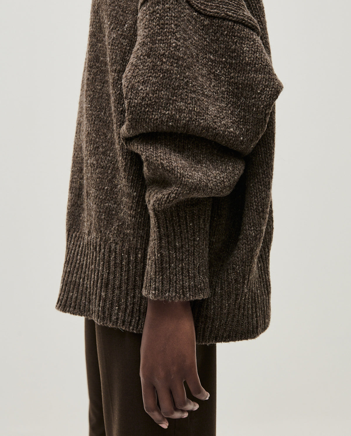 Babaà No90 Oak women's jumper in cozy knit fabric, featuring a relaxed fit and neutral oak color, displayed on a white background.