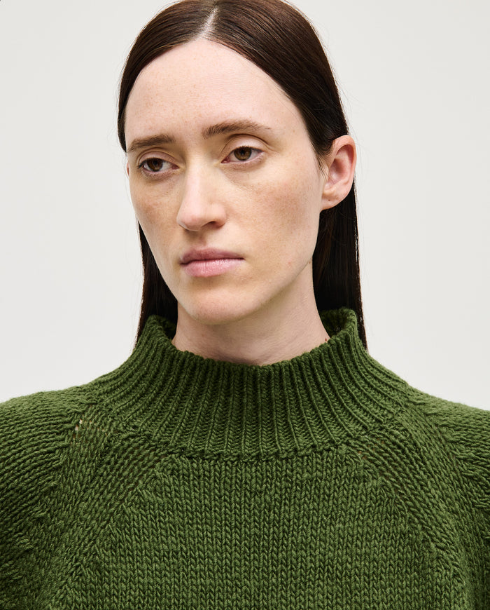 Babaà No95 forest jumper for women, featuring a cozy knit design in forest green, displayed on a model.