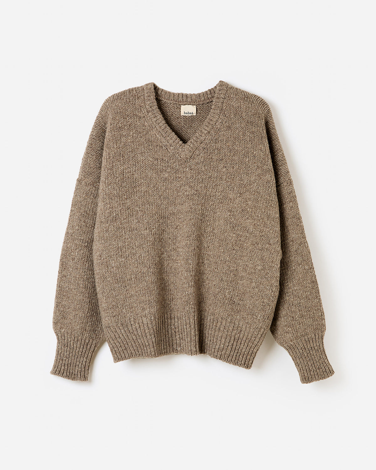Babaà jumper No97 in dark mist, worn by a woman, featuring a cozy knit silhouette and stylish fit.