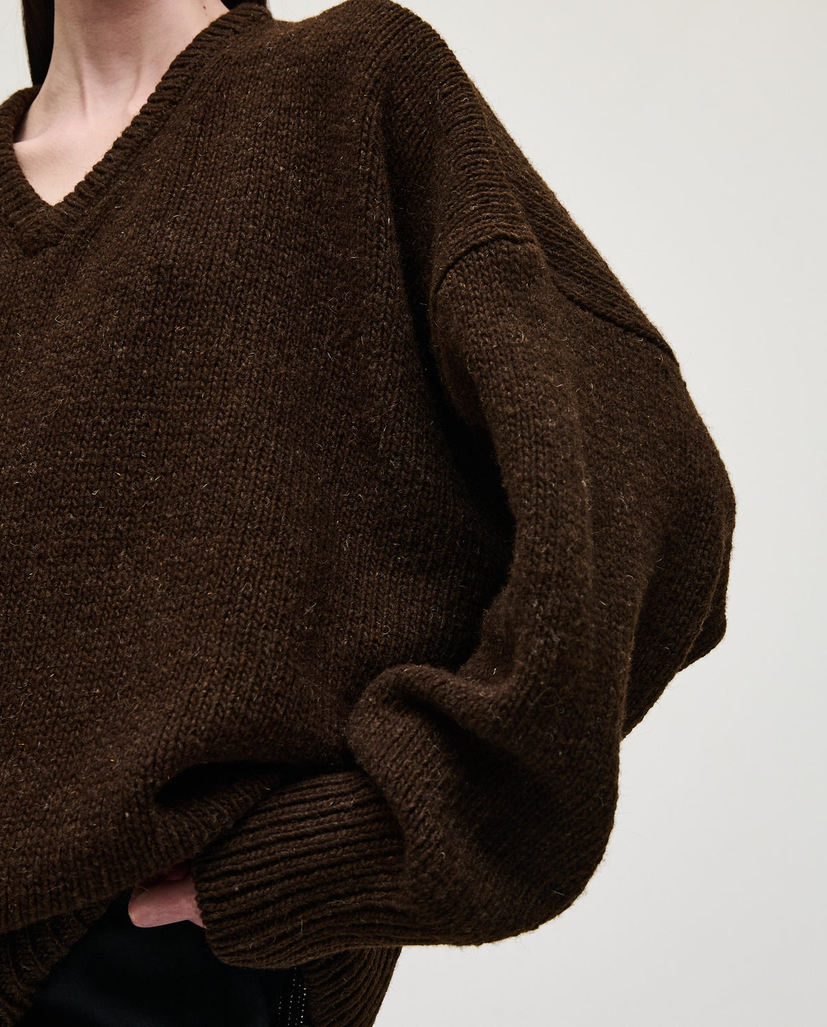 Babaà no97 Earth women's jumper in soft, earthy-toned knit fabric, shown on a model with a relaxed fit and long sleeves.