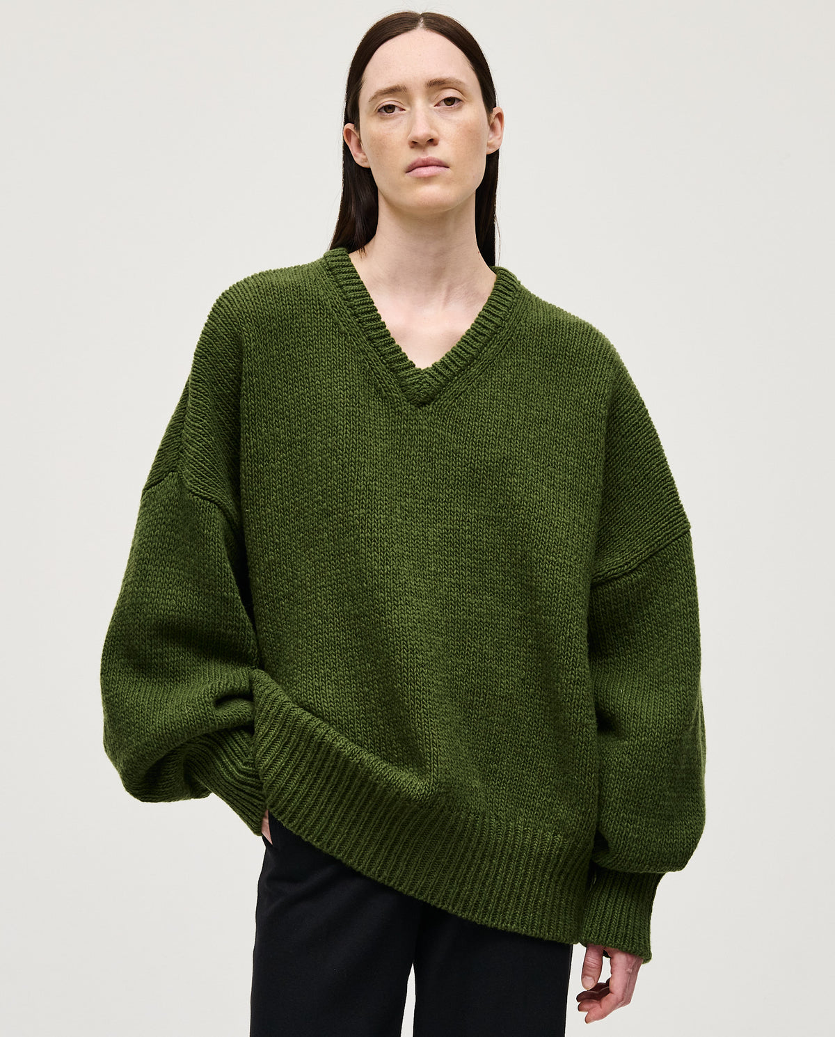 Babaà No97 forest-colored women's jumper, cozy knit sweater with a relaxed fit, showcased in a close-up image.