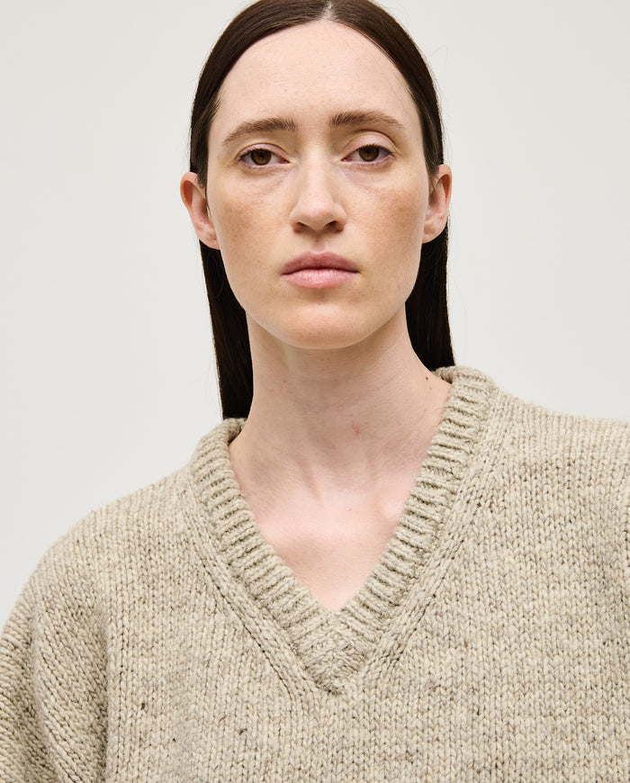 Woman wearing Babaà No97 Mist jumper, showcasing the soft, cozy knit in a stylish, relaxed fit.