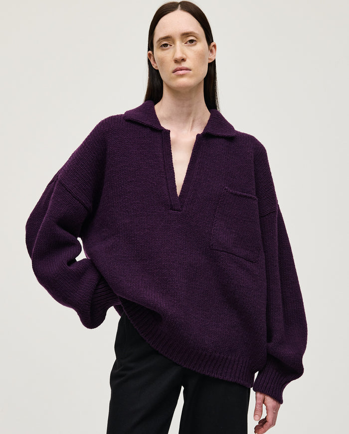 Purple Babaà Polo No93 worn by woman, showcasing classic fit and soft fabric in a stylish casual look.