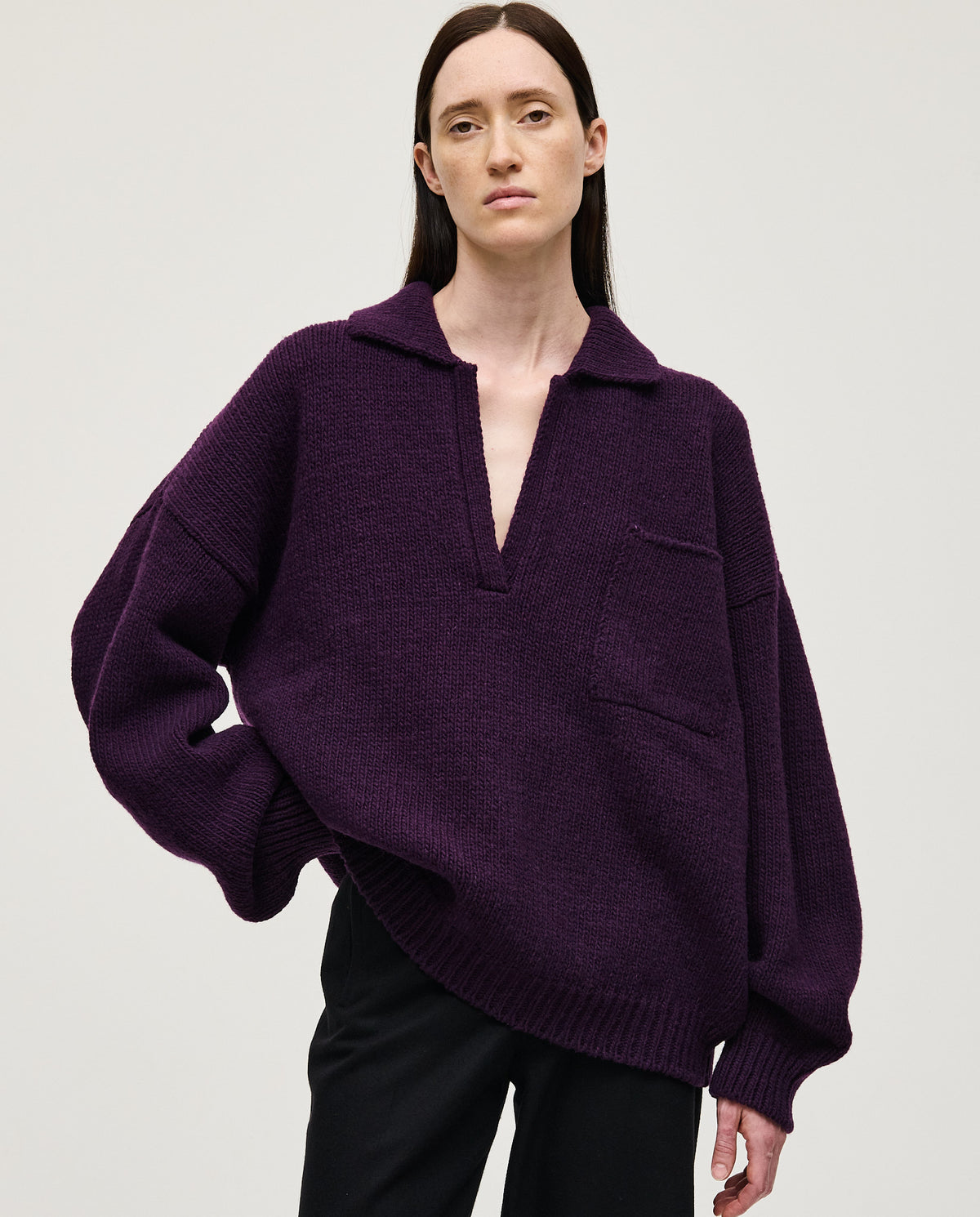 Purple Babaà Polo No93 worn by woman, showcasing classic fit and soft fabric in a stylish casual look.