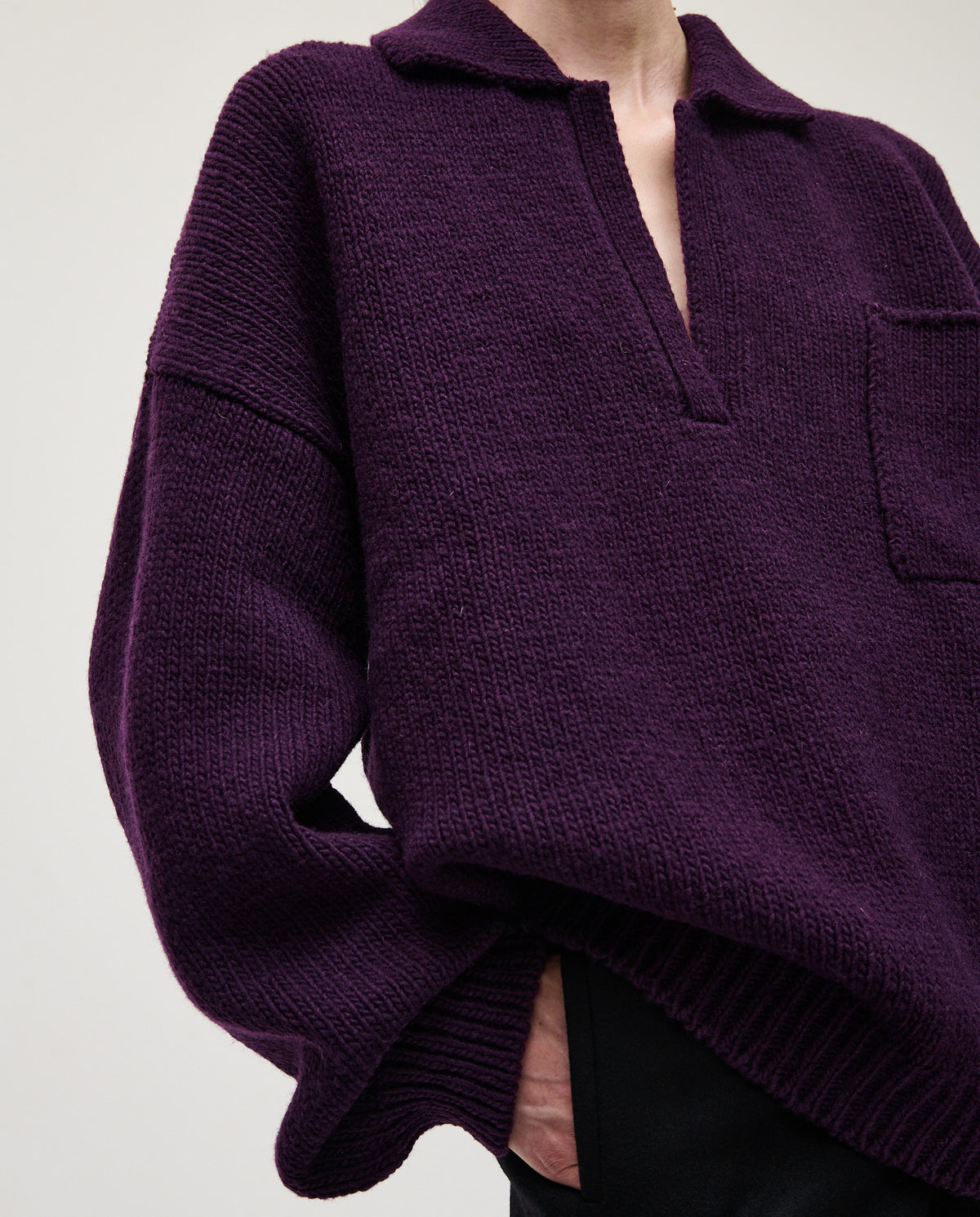 Purple Polo No93 by Babaà worn by a woman, featuring a classic fit and soft fabric, styled for casual elegance.