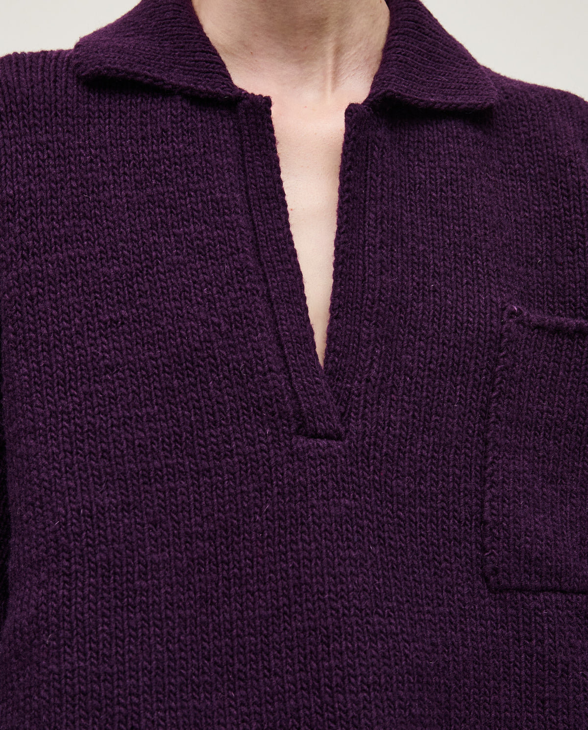 Purple Babaà Polo No93 worn by a woman, featuring a classic fit and soft fabric, styled casually.