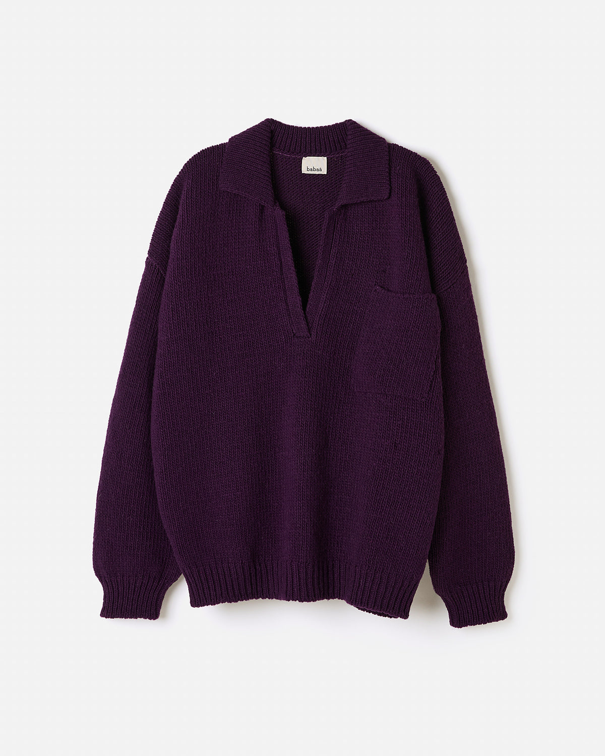 Silhouette of a woman wearing a purple Babaà Polo No93 shirt, showcasing the relaxed fit and soft fabric.