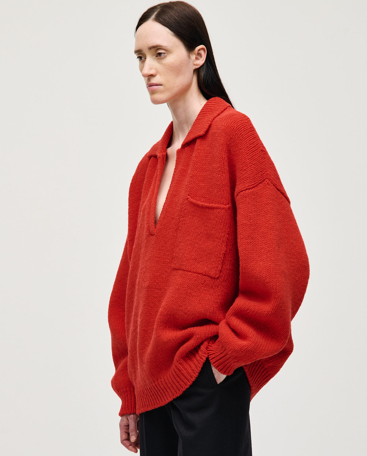 Red Polo No93 by Babaà, shown on a woman, featuring a classic fit with a collar and short sleeves.