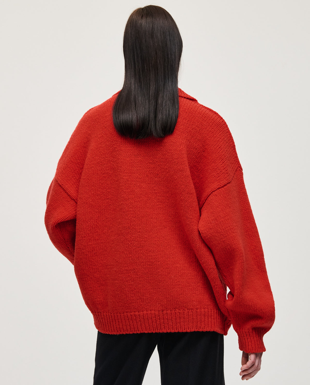 Red Babaà Polo No93 for women, featuring a classic fit and collar, shown on a model with a casual style.