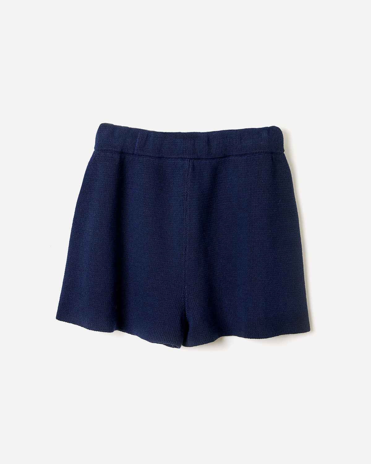 Navy babaà Shorts No35 on a woman, showcasing a stylish and comfortable fit with a relaxed silhouette.