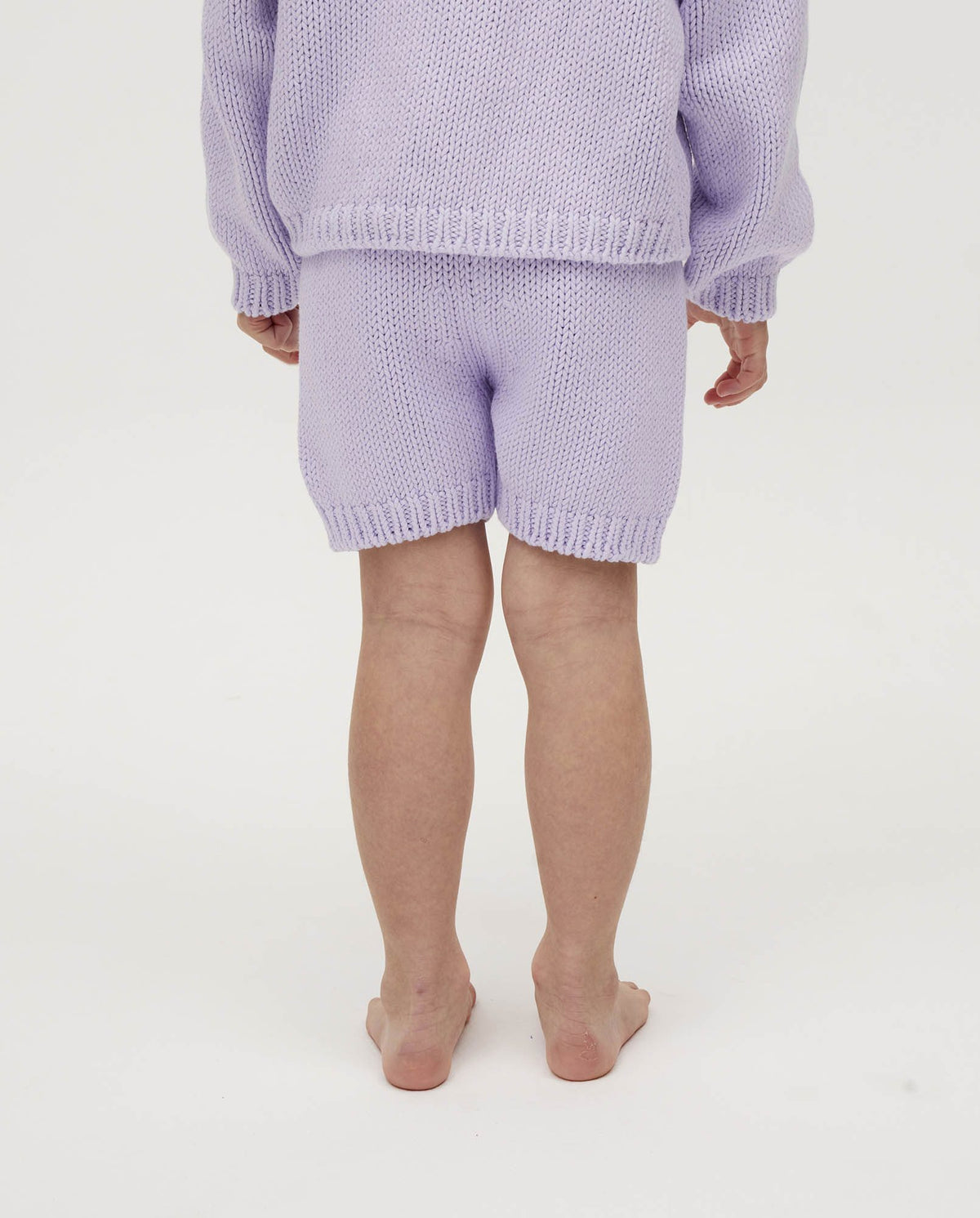 Kids' shorts by Babaà in violet milk color, featuring a comfortable fit and casual style, shown on a child.