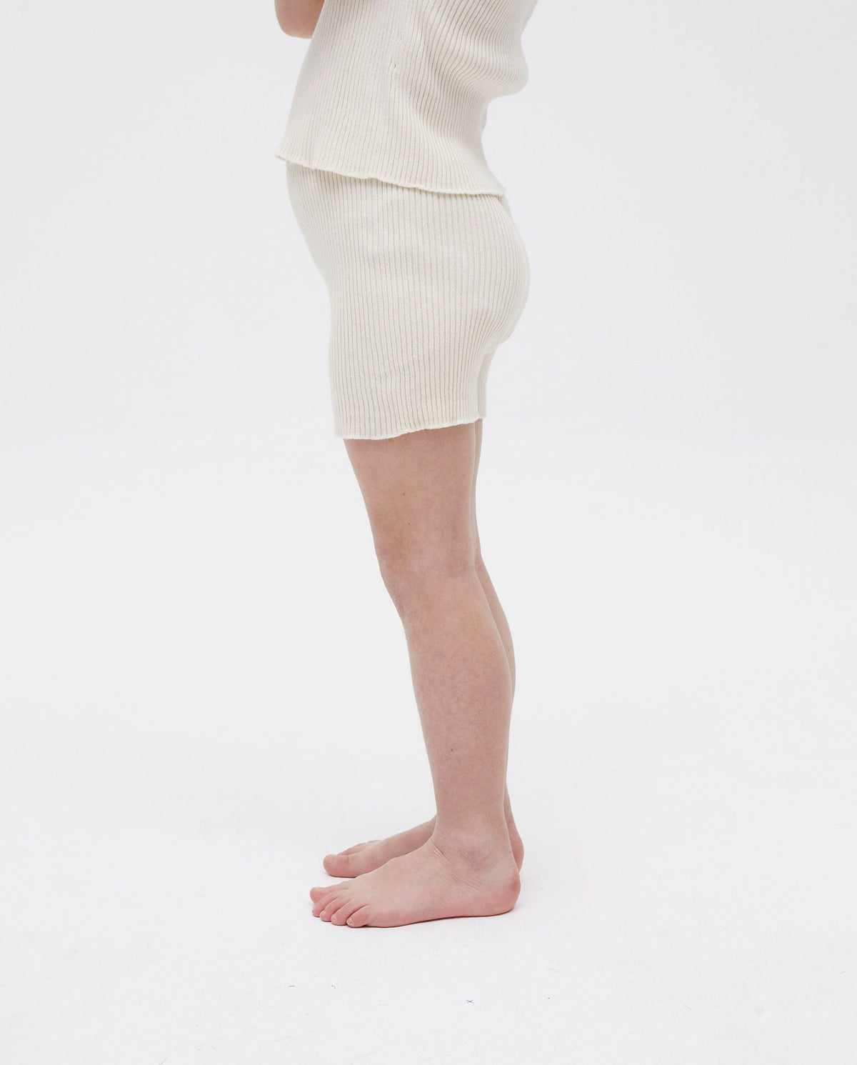 Kids' shorts Babaà No39 in natural color, made of lightweight fabric, featuring a comfortable fit and casual style for children.