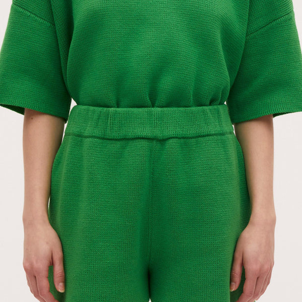Babaà No35 Wild Fern shorts featuring a vibrant green fern print, with a relaxed fit and casual style.