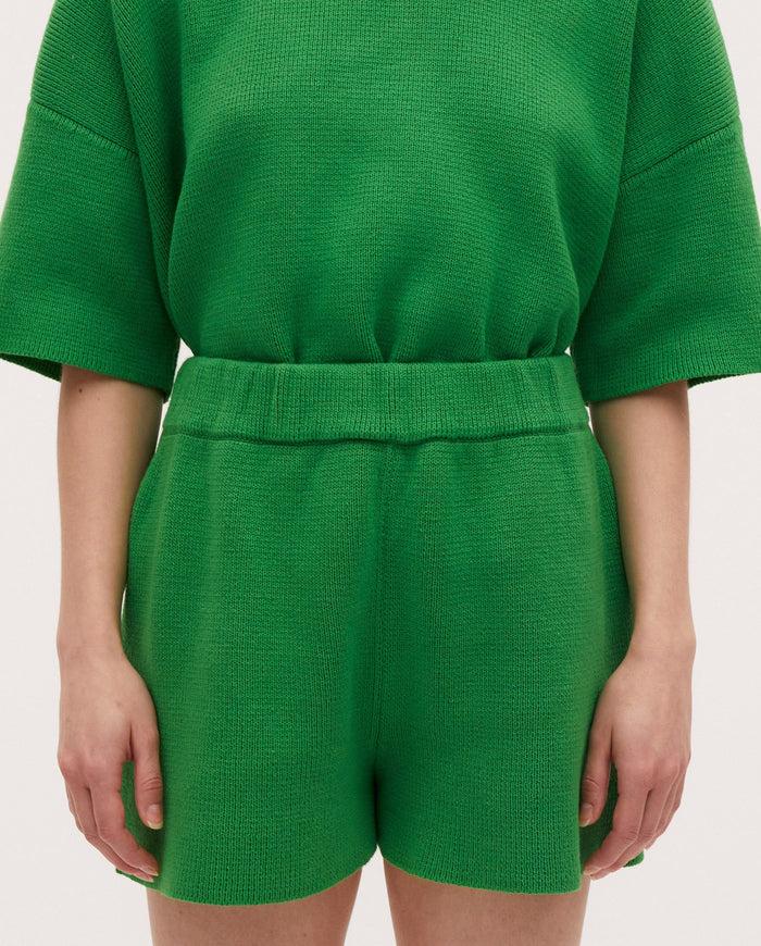Babaà No35 Wild Fern shorts featuring a vibrant green fern print, with a relaxed fit and casual style.