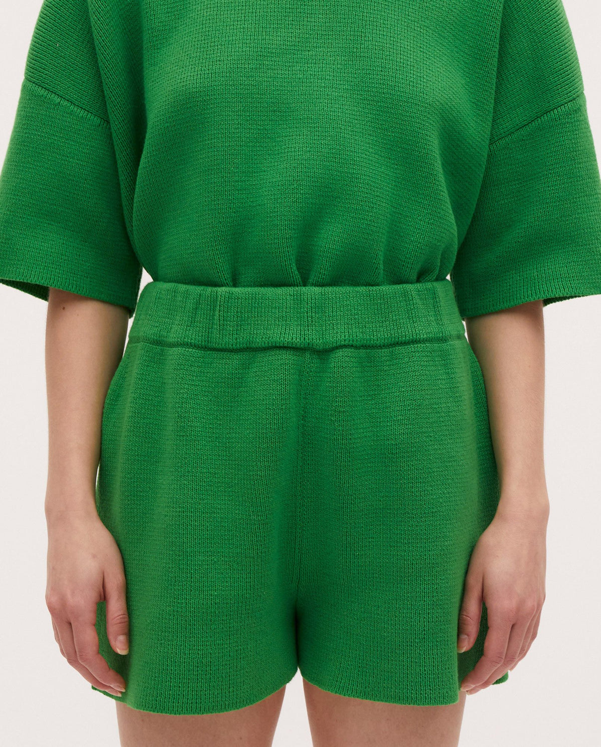 Babaà No35 Wild Fern shorts featuring a vibrant green fern print, with a relaxed fit and casual style.