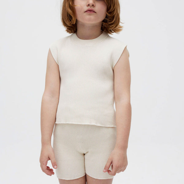 Natural top for kids no39 by Babaà, made from soft fabric, shown in a light, natural color suitable for children.
