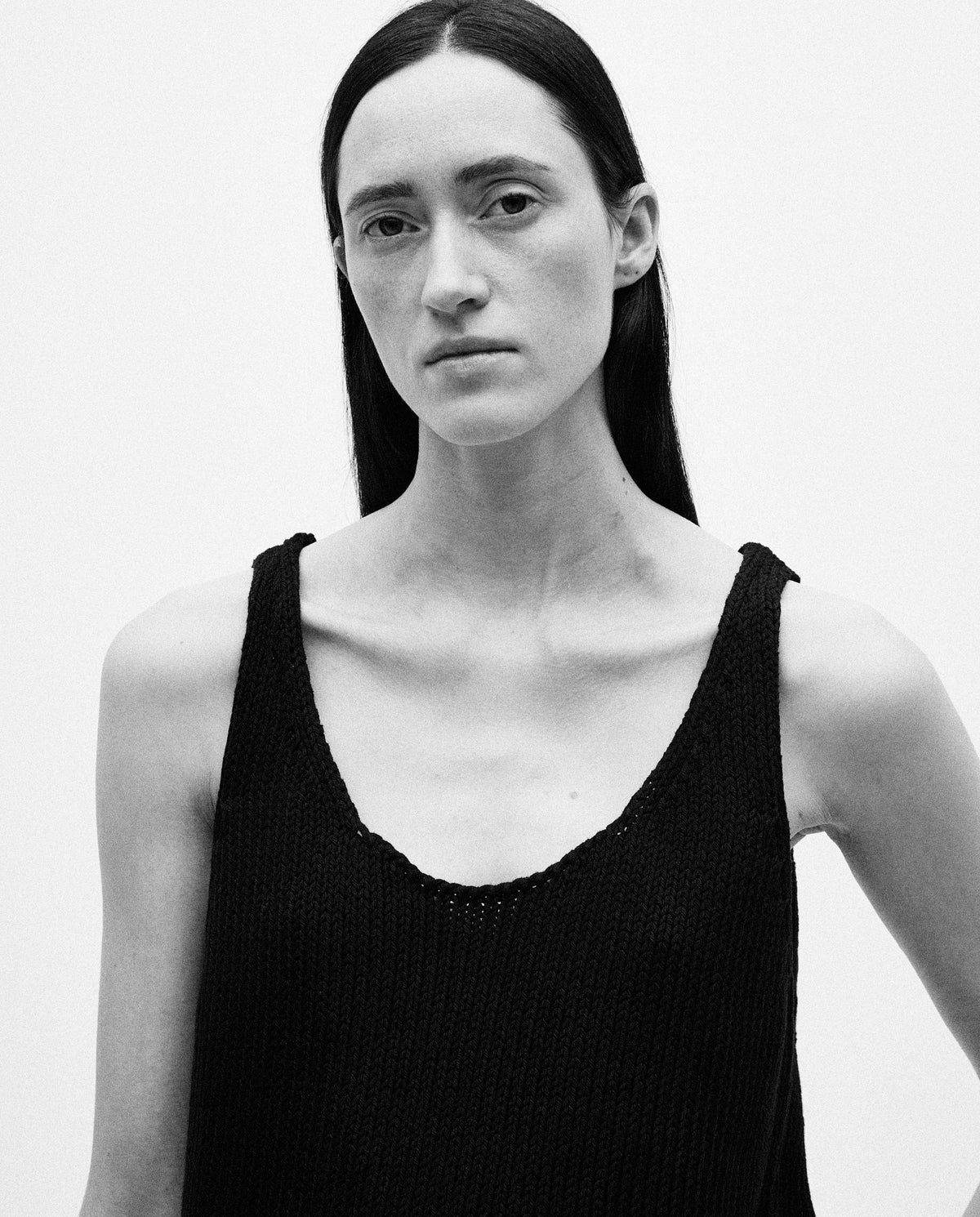 Black top from Babaà, designed for women, featuring a stylish and comfortable fit, shown on a model.