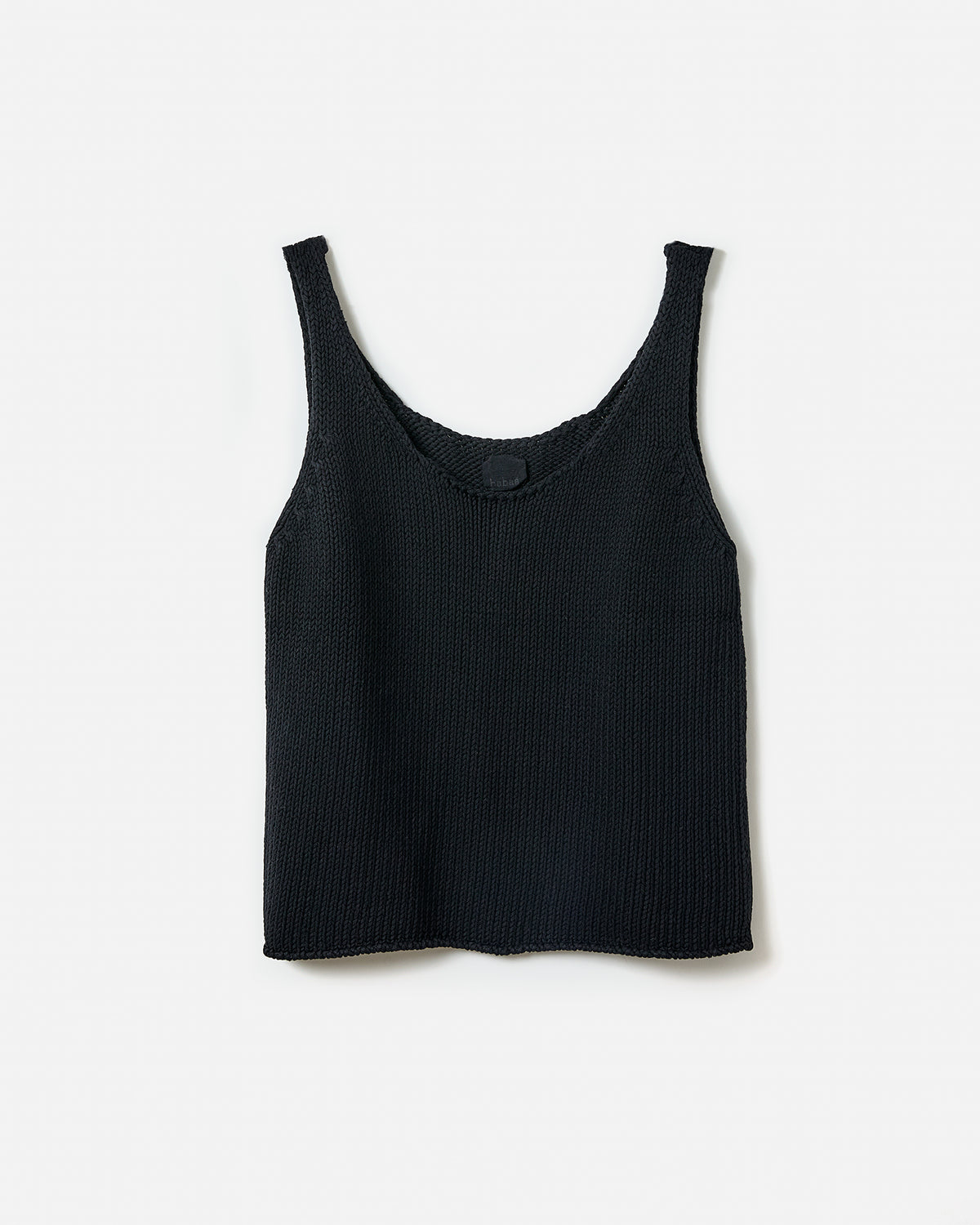 Black top No1 by Babaà, worn by a woman, silhouette view highlighting the fitted style and sleek design.