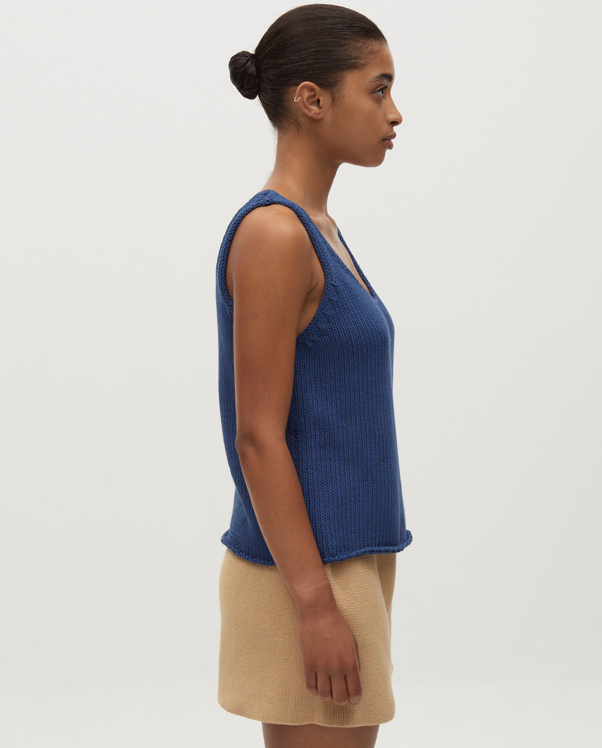 Babaà Top No1 Deep Water worn by a woman, featuring a stylish deep water design, close-up view of the fashionable swimwear.