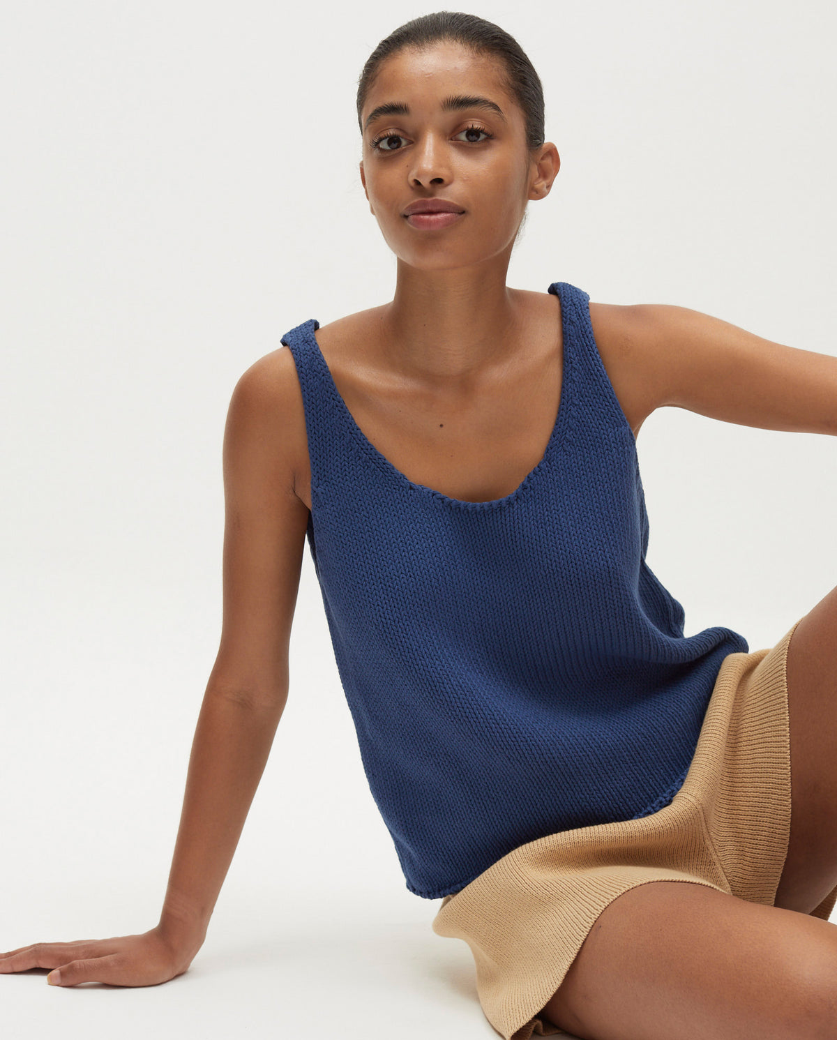 Babaà Top No1 Deep Water worn by a woman, featuring a stylish design and vibrant colors, perfect for summer or swimwear.