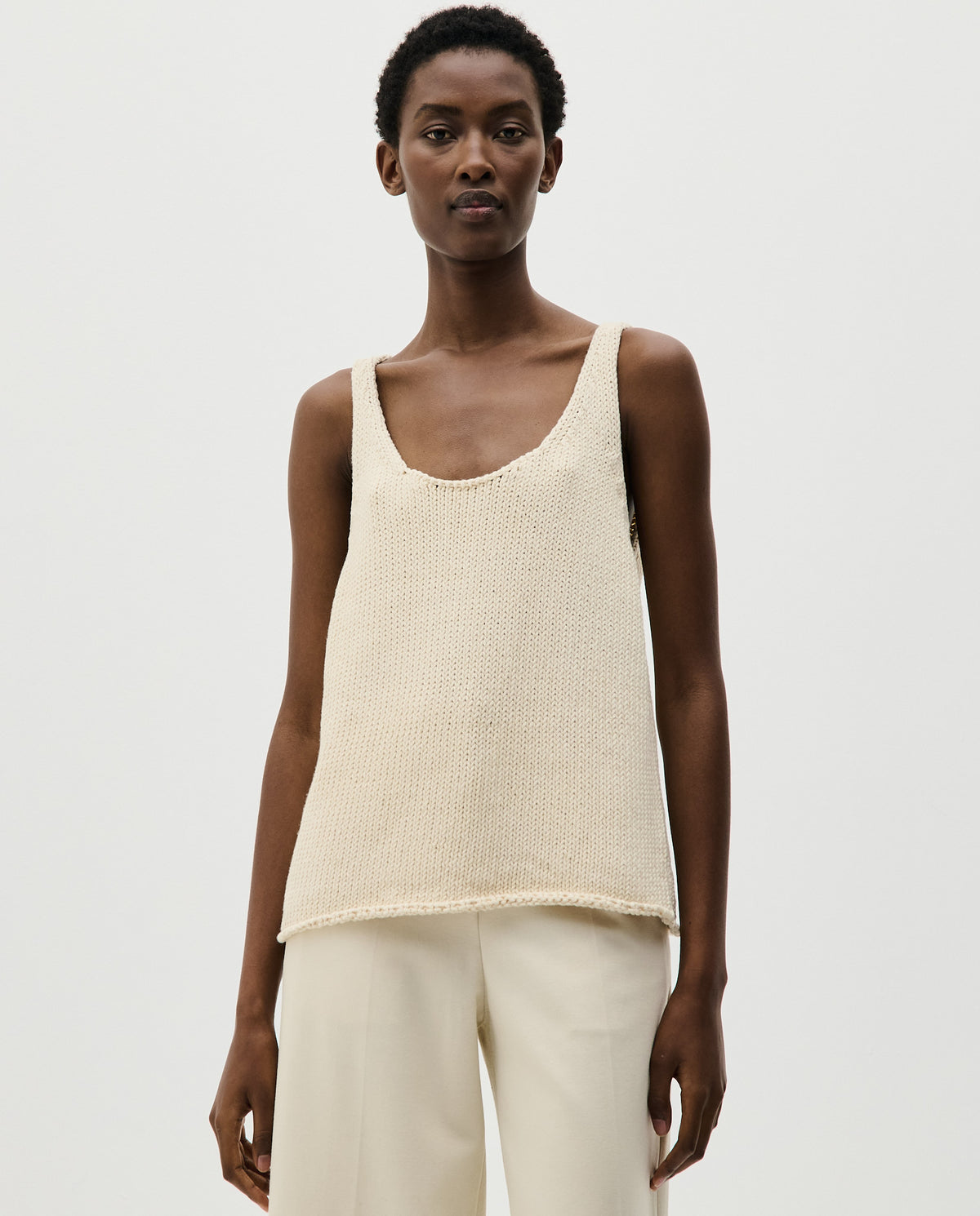 Woman wearing Babaà Top No1 Natural, showcasing a stylish, comfortable natural fabric top for casual wear.