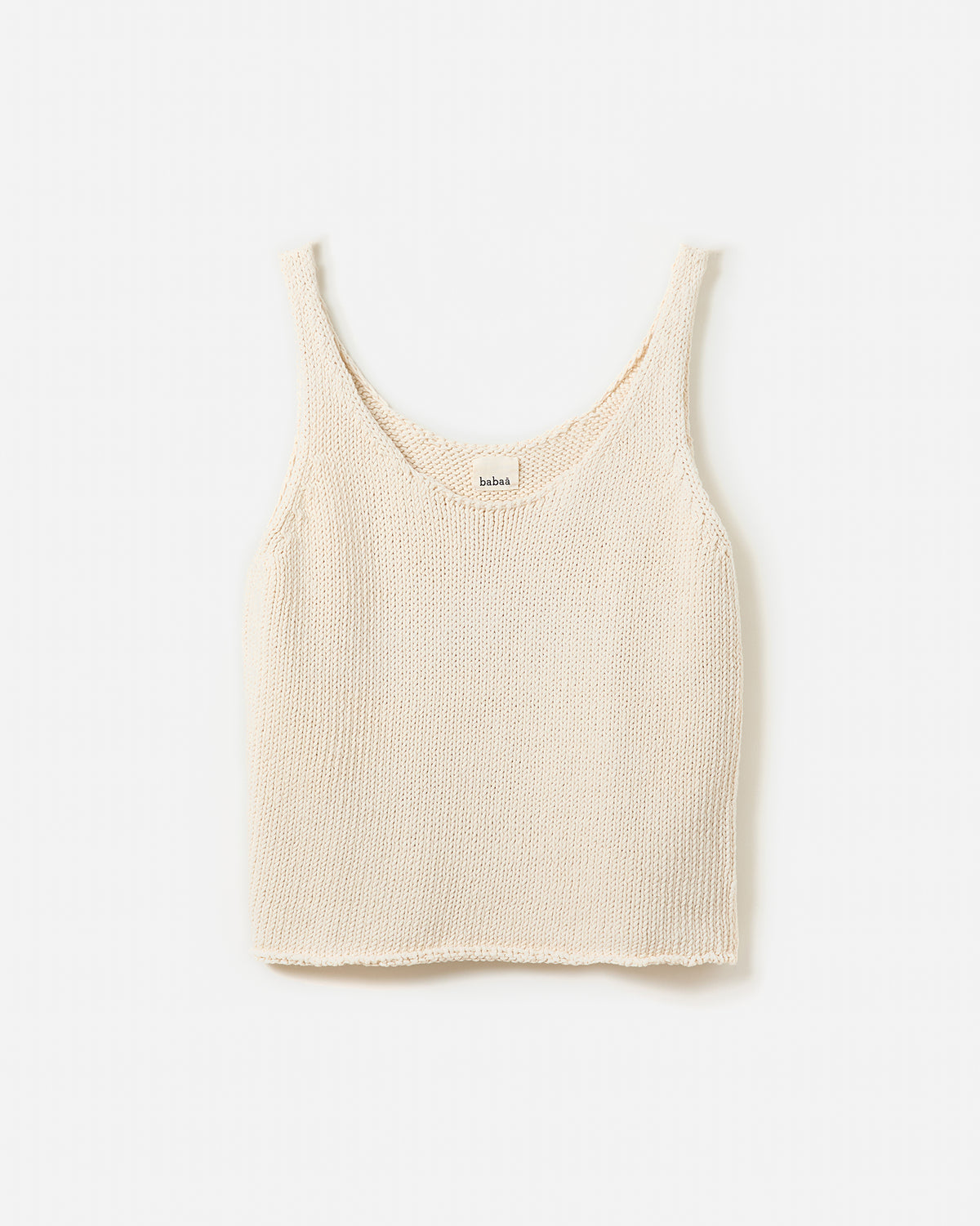 Silhouette of a woman wearing the Babaà Top No1 Natural, showcasing a stylish and comfortable sleeveless top design.