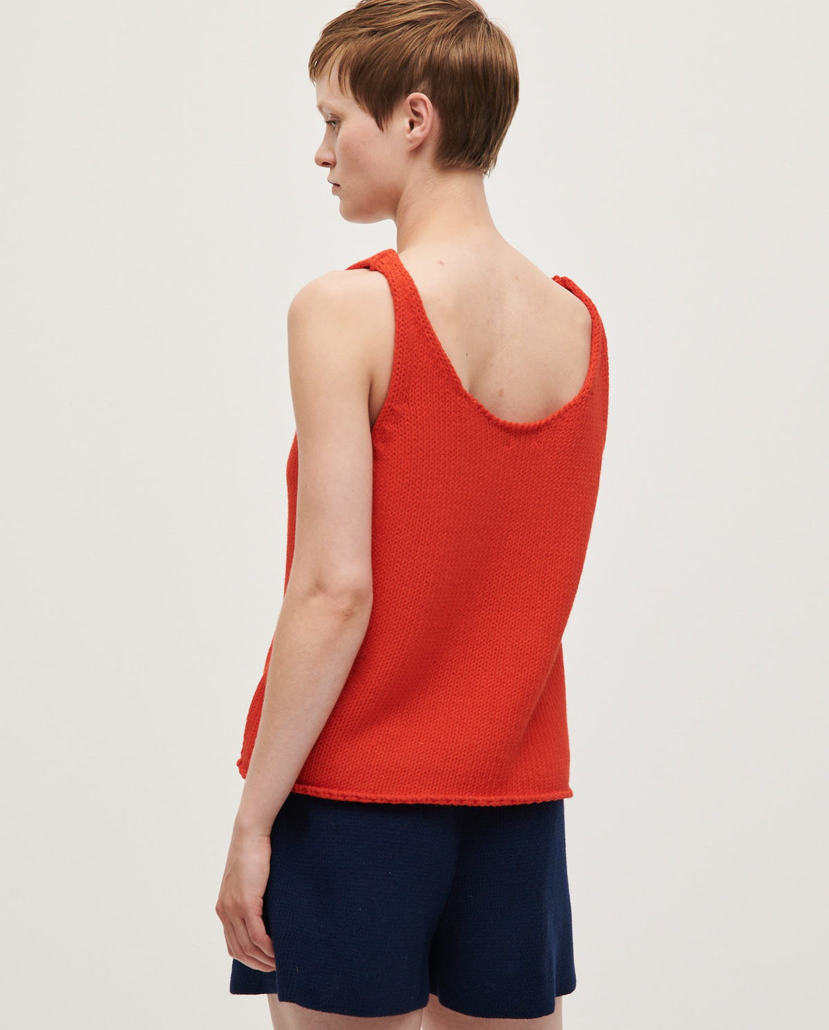 Babaà Top No1 Summer Flame worn by a woman, featuring vibrant flame print and lightweight fabric for warm weather style.