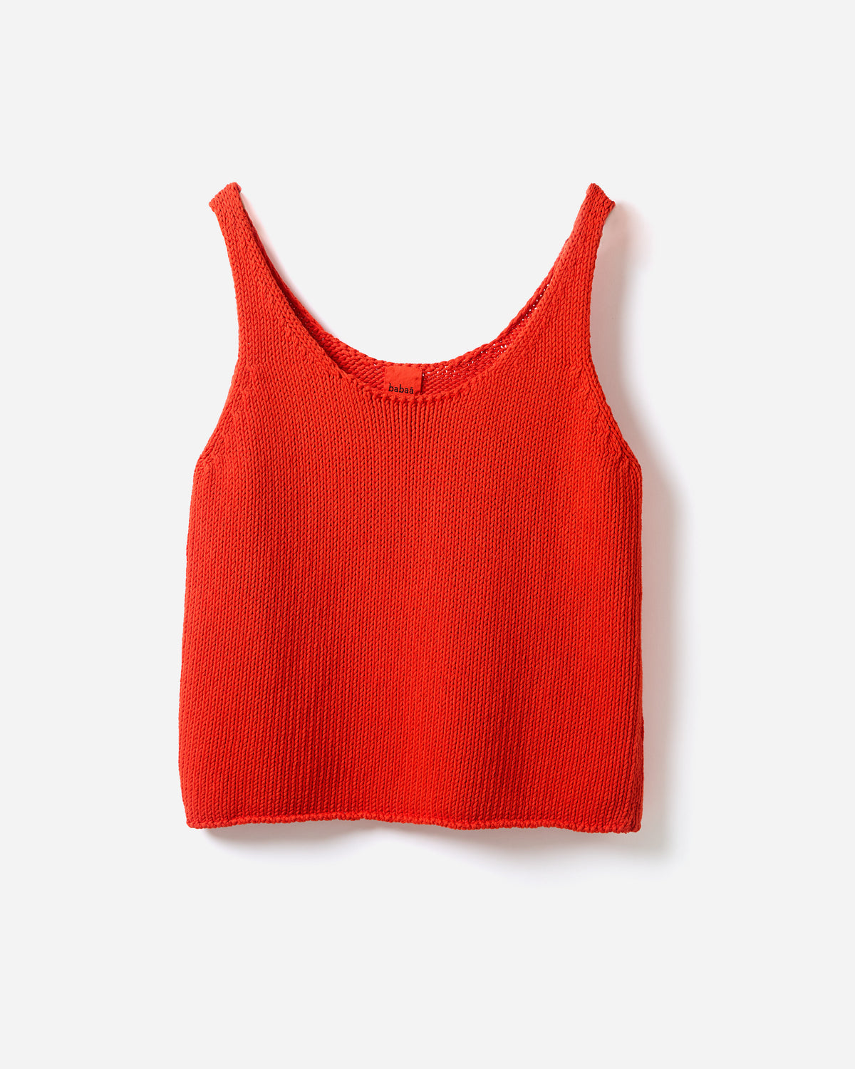 Silhouette of a woman wearing the Babaà Top No1 Summer Flame, stylish sleeveless top with vibrant flame design for summer.