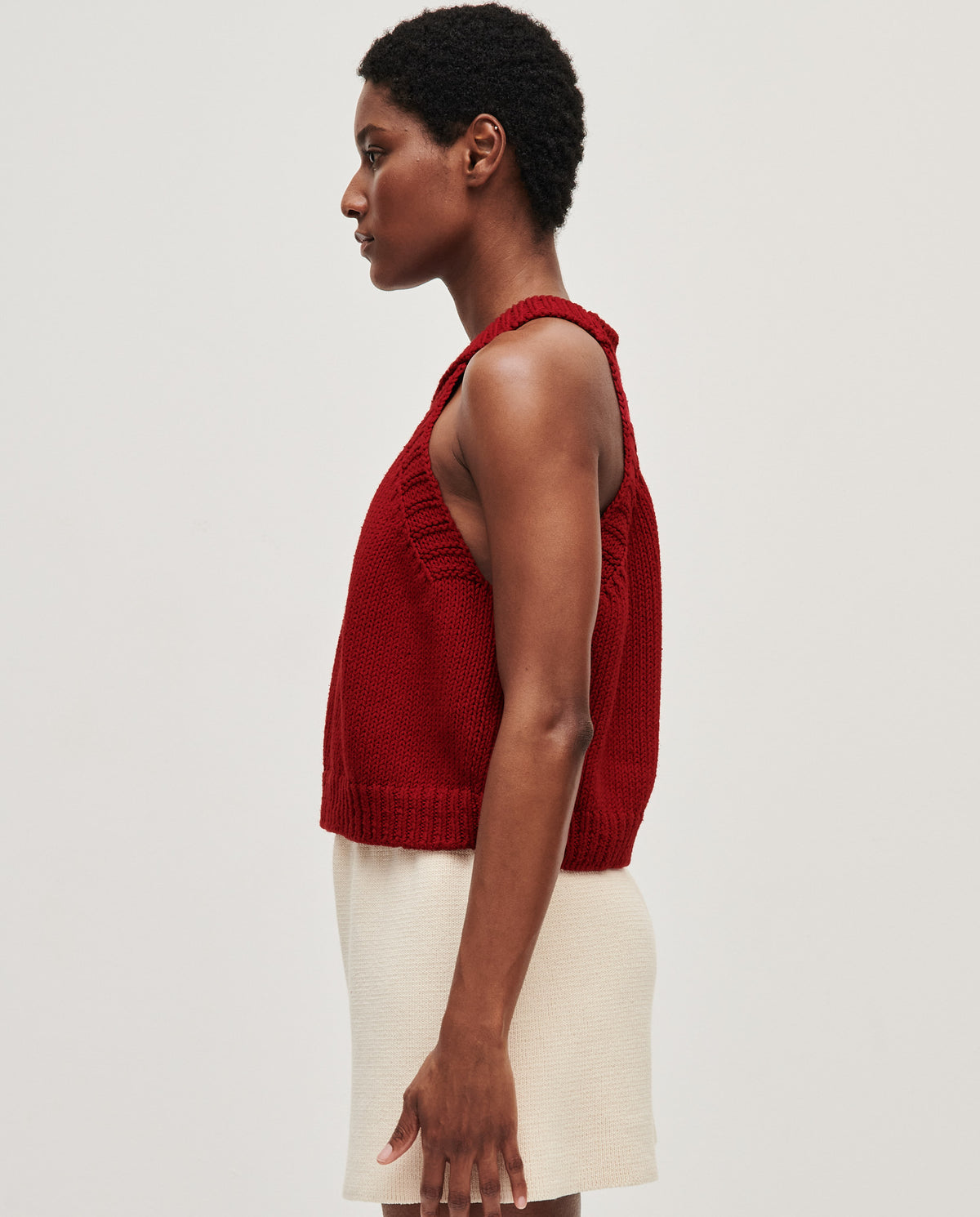 Babaà Top No2 Persephone worn by a woman, stylish sleeveless top with a relaxed fit and floral pattern, casual summer fashion.