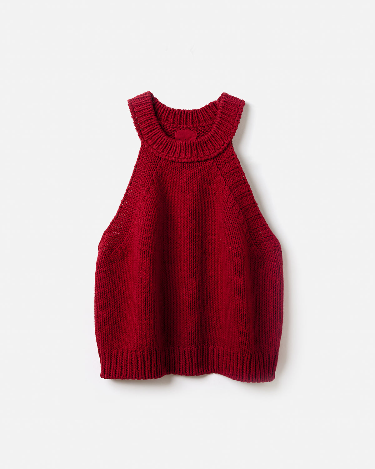 Silhouette of a woman wearing Babaà Top No2 Persephone, a stylish sleeveless top with a fitted design.