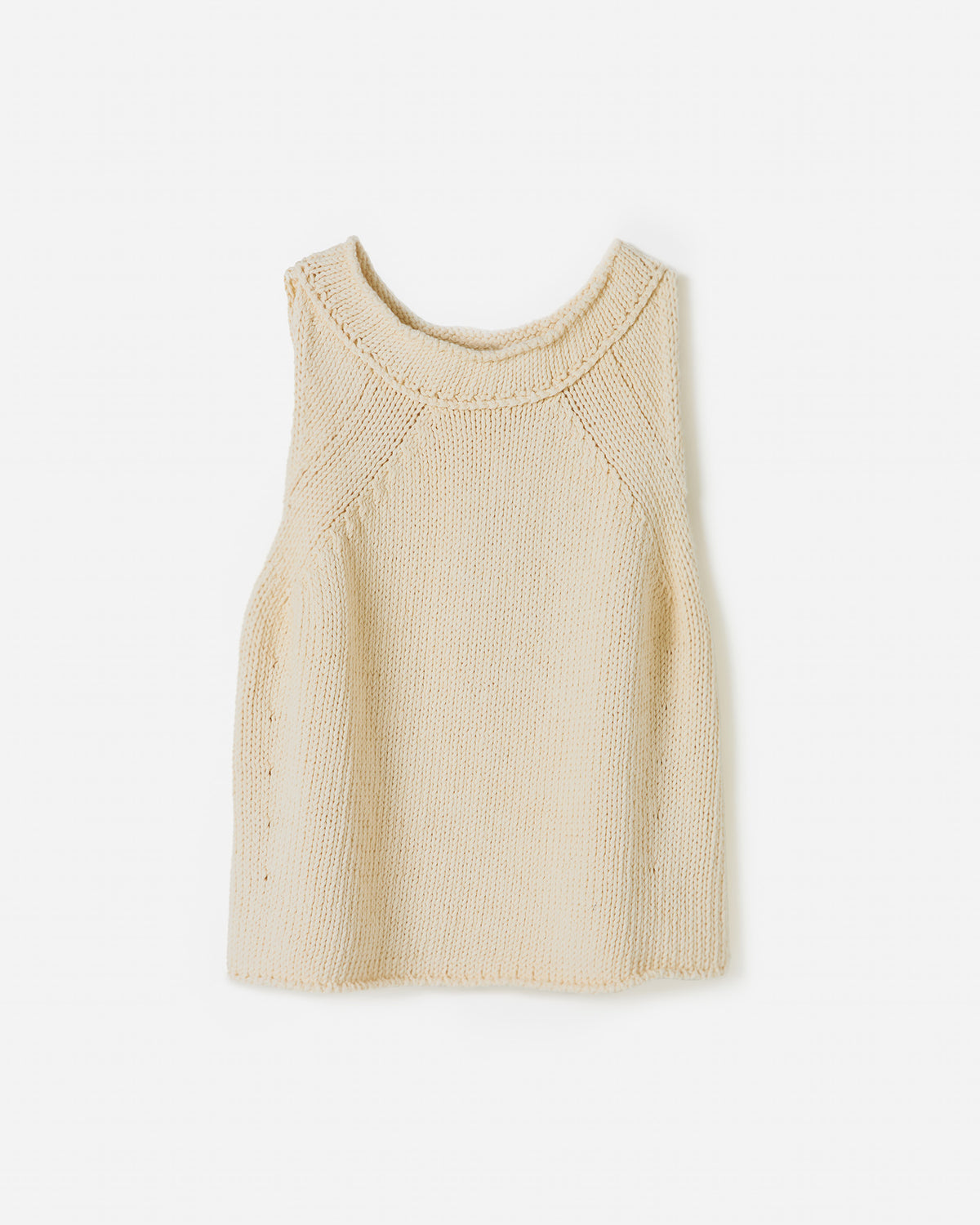 Silhouette of a woman wearing Babaà Top No46 Natural, showcasing its relaxed fit and natural fabric in a stylish profile image.