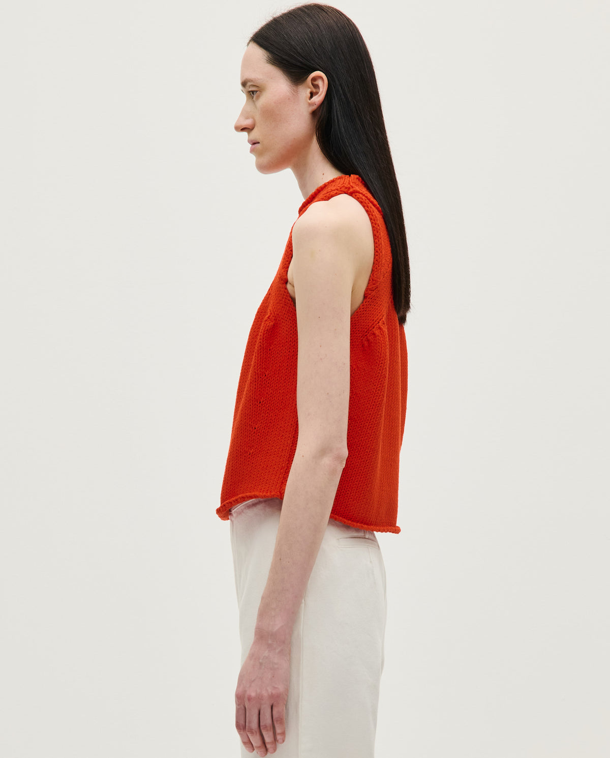 Woman wearing Babaà Top No46 Summer Flame, stylish sleeveless top with vibrant flame pattern, perfect for summer outfits.