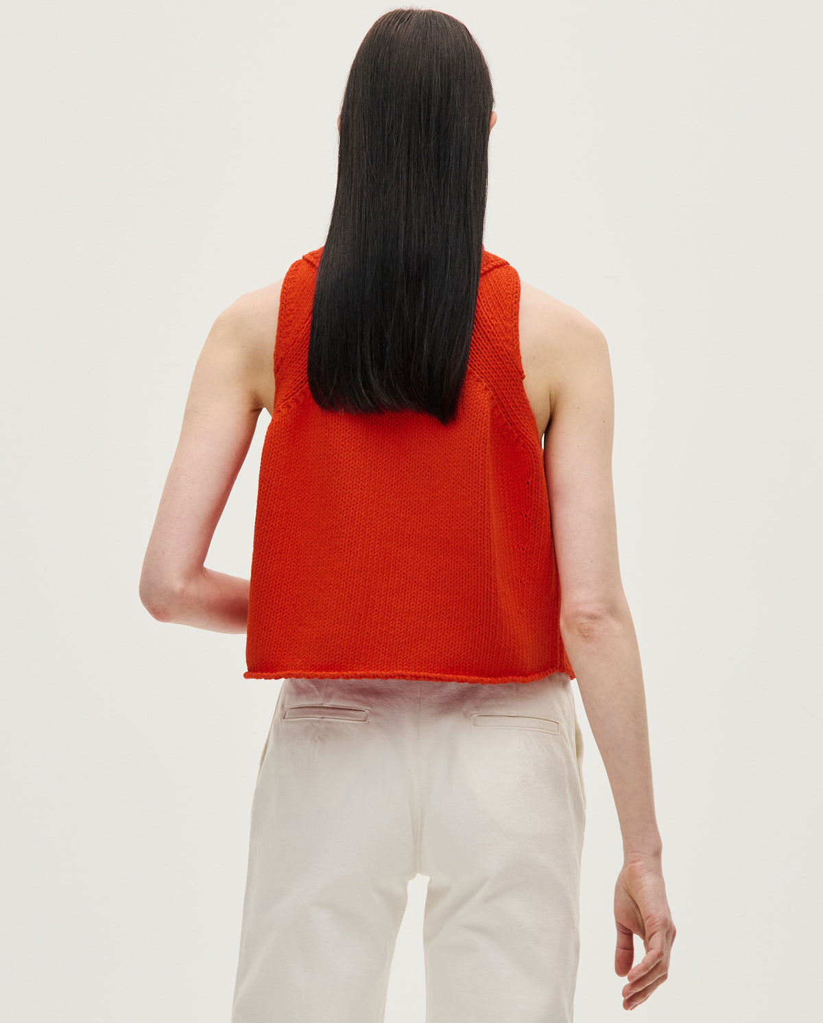 Woman wearing Babaà Top No46 Summer Flame, lightweight sleeveless top with vibrant flame print, casual summer fashion.