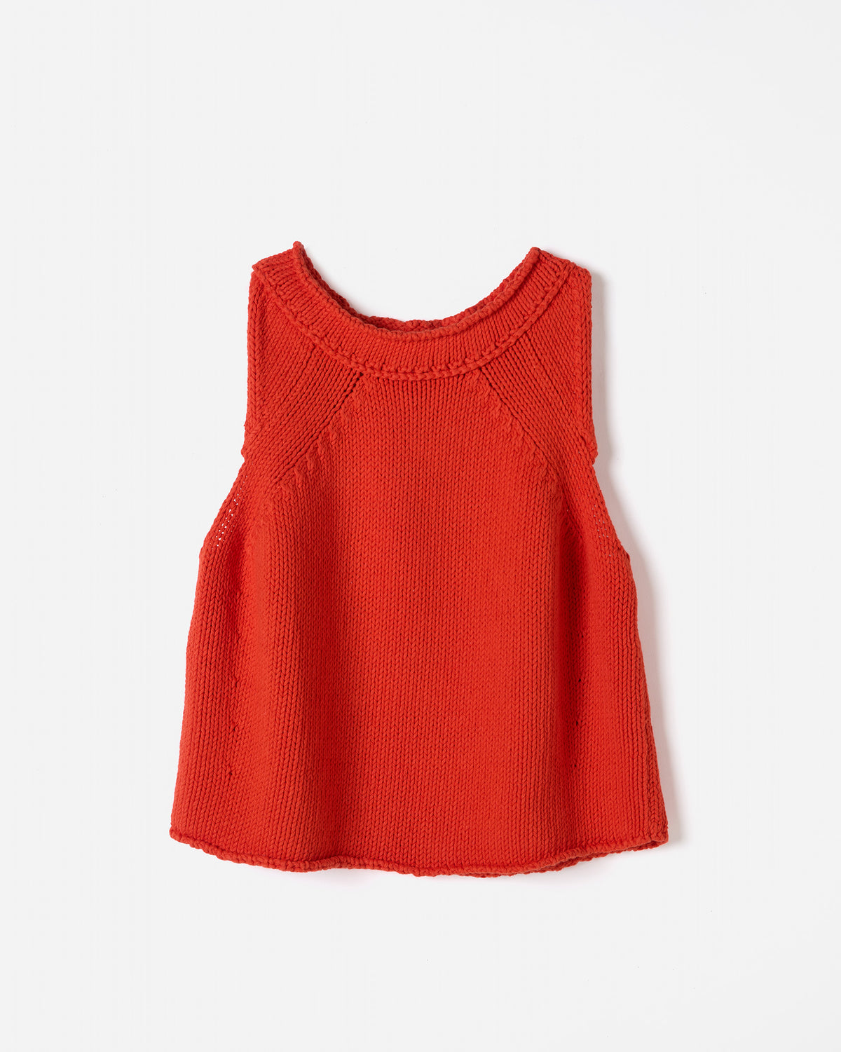Woman wearing Babaà Top No46 Summer Flame, stylish sleeveless top with vibrant flame pattern, perfect for summer wear.