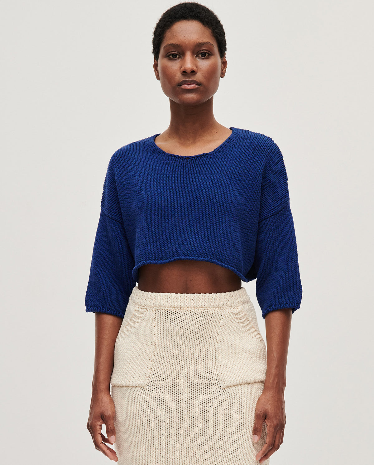 Babaà Top No9 Puddle worn by a woman, featuring a stylish, casual design with a loose fit and soft fabric.