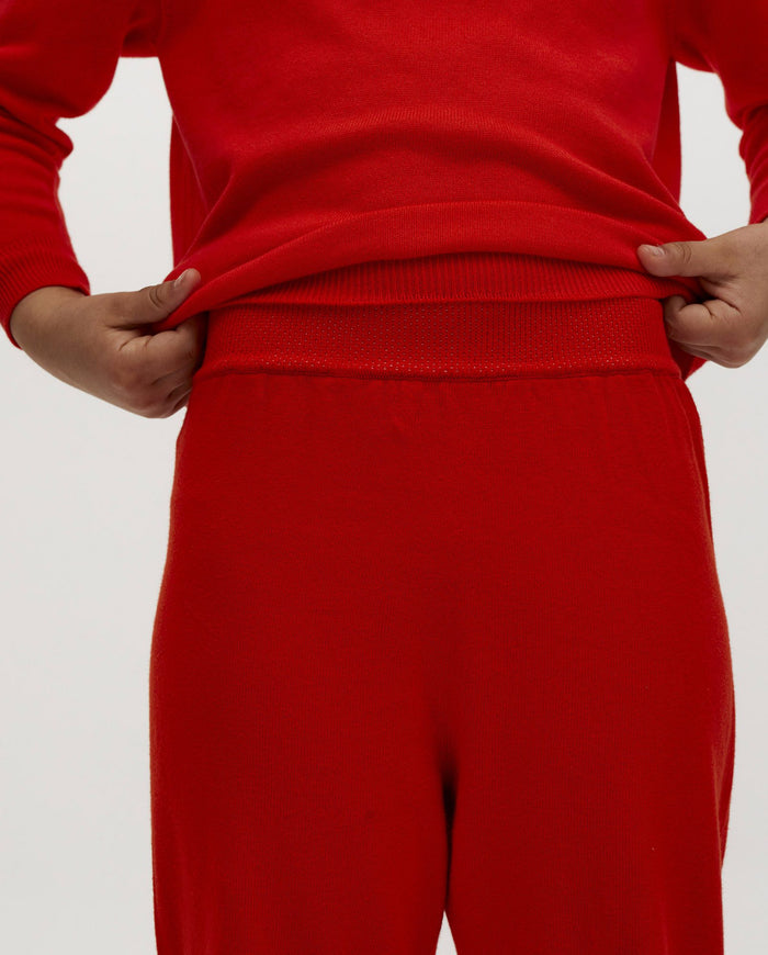 Kids' summer flame trousers by Babaà featuring lightweight fabric and vibrant flame pattern, perfect for warm weather.
