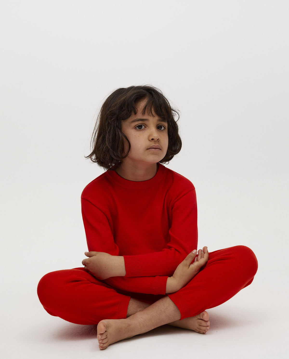 Kids' summer flame trousers by Babaà, lightweight fabric with a colorful flame pattern, perfect for warm weather.