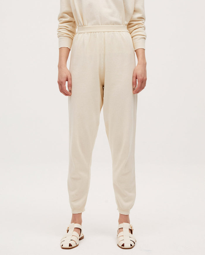 Babaà No37 natural trousers featuring a relaxed fit, soft fabric, and neutral color, suitable for casual or stylish wear.
