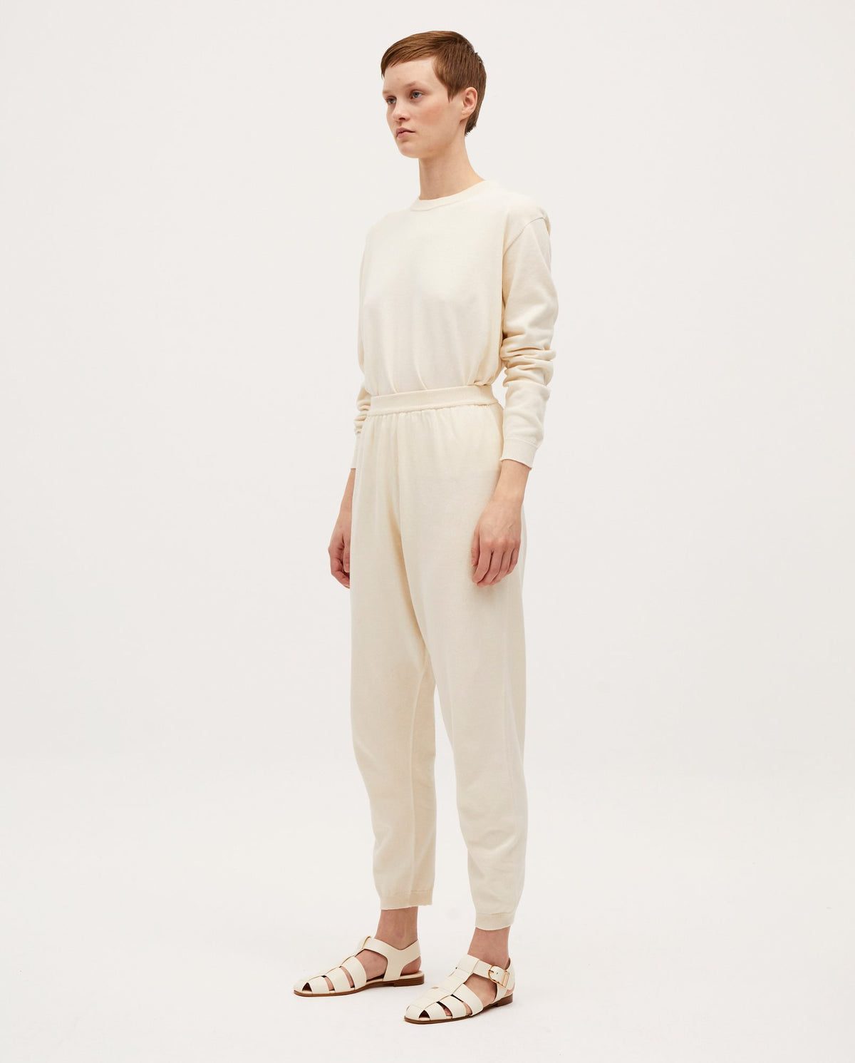 Babaà No37 natural women's trousers showing a relaxed fit with a waistband and straight-leg design on a neutral background.