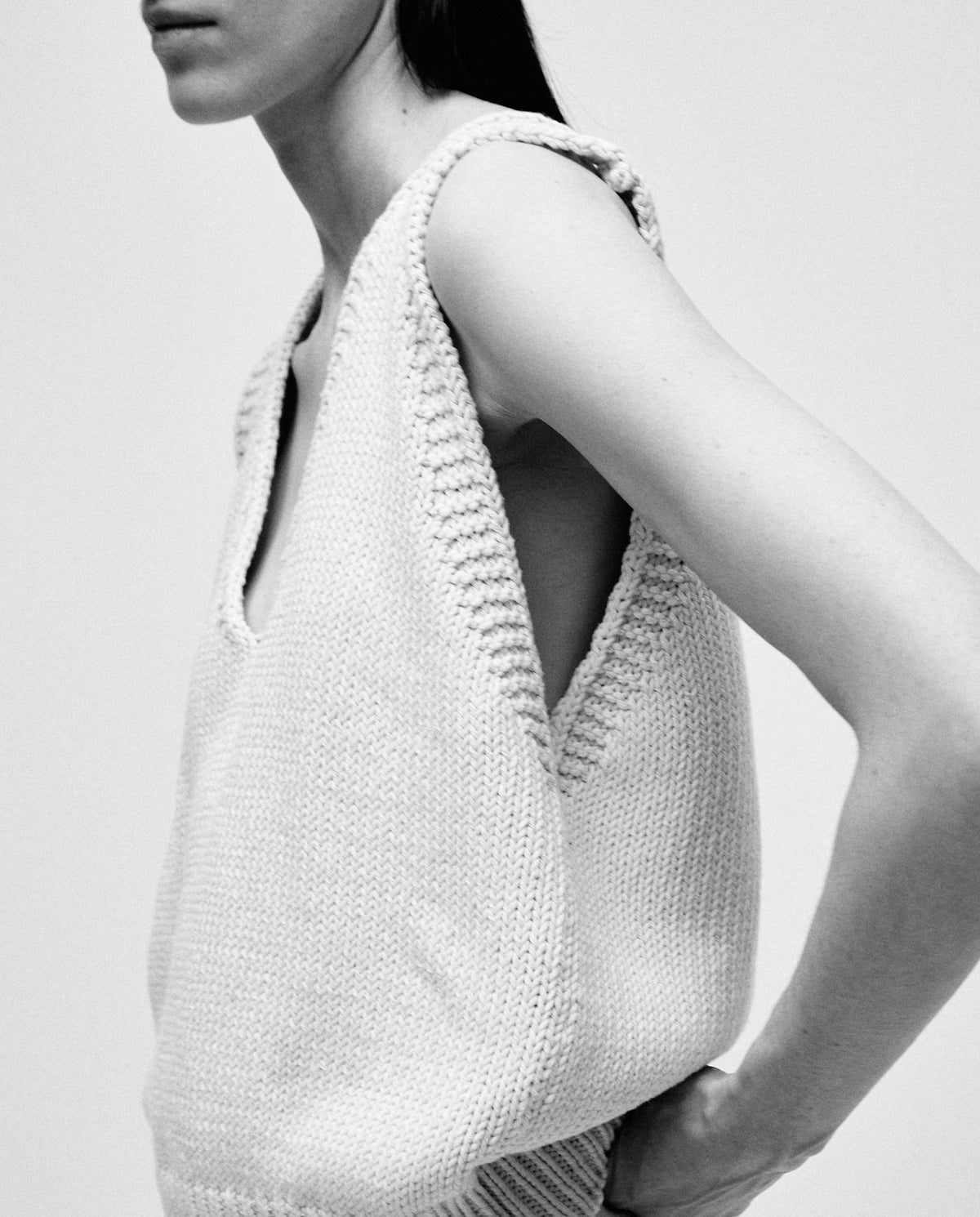 Woman wearing Babaà No24 Natural vest, featuring a soft, natural fabric with a relaxed fit and minimalist design.
