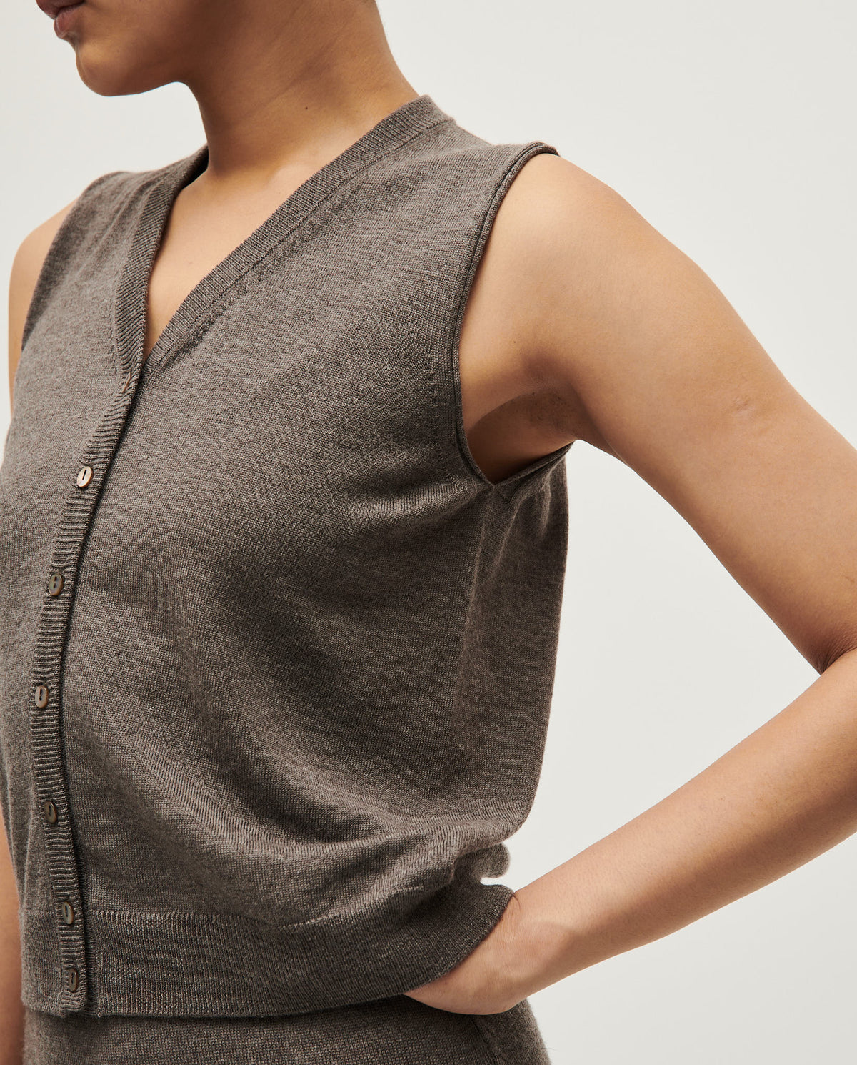 Babaà vest No25 Volcán women's vest in vibrant volcanic orange, featuring a cozy, stylish design with a high collar and sleeveless fit.