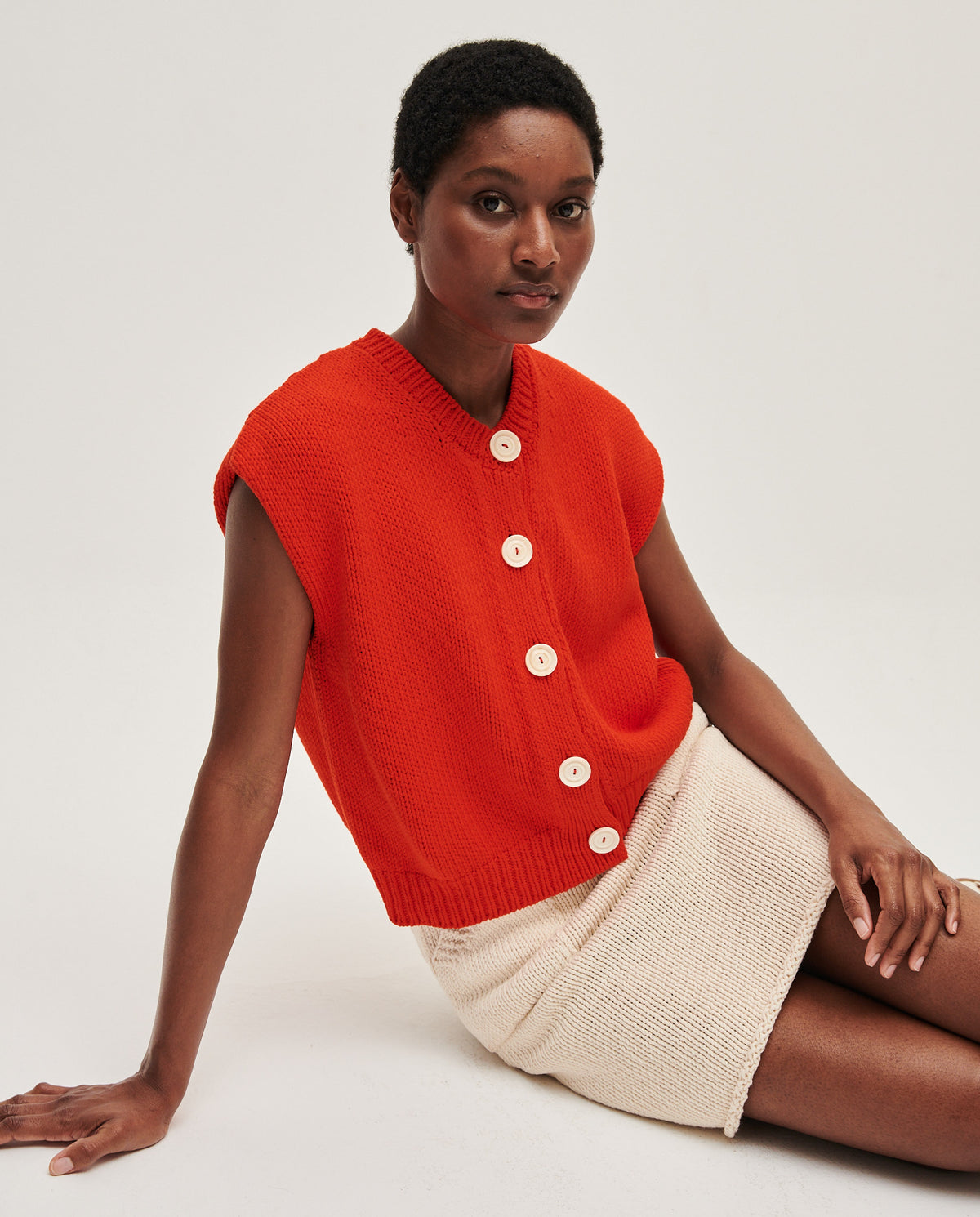 Babaà No26 Summer Flame women's vest with vibrant flame pattern, lightweight fabric, and sleeveless design.