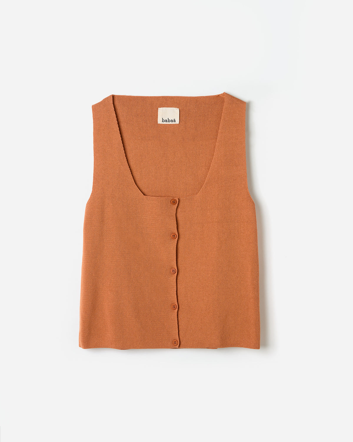 Woman wearing Babaà No39 Cognac vest, showcasing its stylish silhouette and rich leather texture.