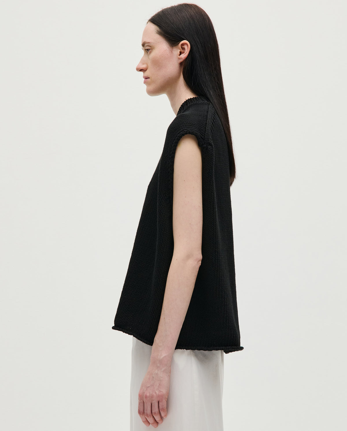 Black Babaà No44 women's vest displayed on a model, showcasing its stylish design and fit.