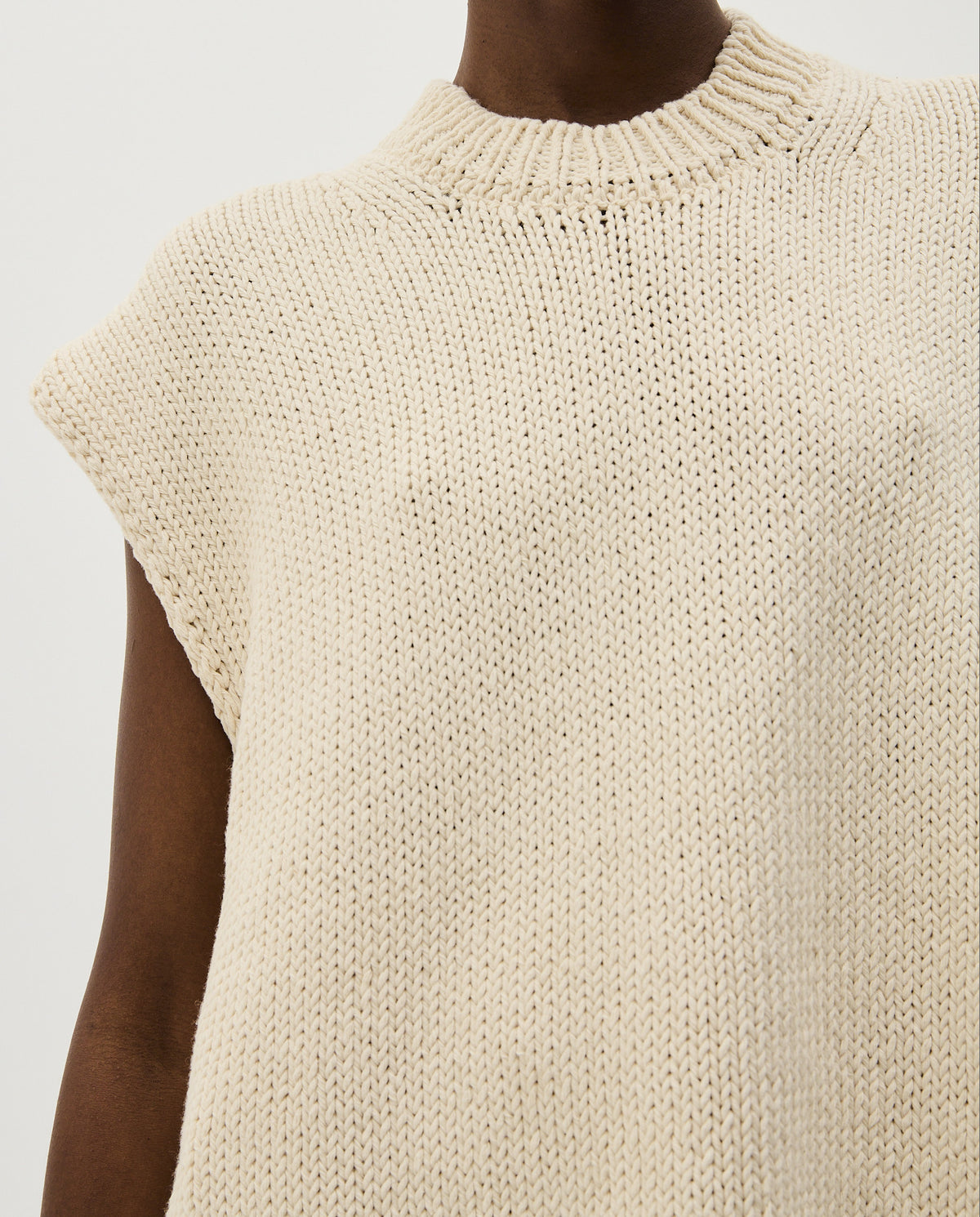 Babaà No44 natural women's vest shown in beige fabric, sleeveless design, front button closure, casual style.