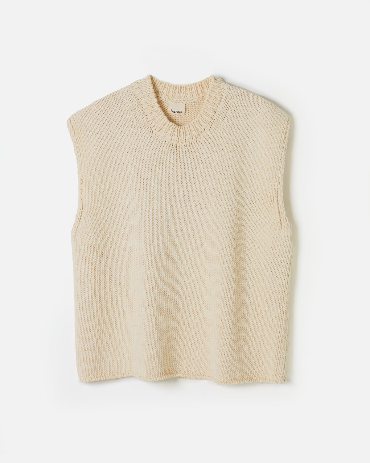 Woman wearing Babaà No44 Natural vest, showcasing a relaxed fit and neutral color, perfect for casual and layered outfits.